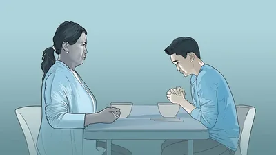 A boy is nervous about praying while his non-Witness mother looks on