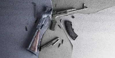 A torn photograph containing two hands shaking in agreement.