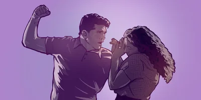 A man raises his fist to hit a woman