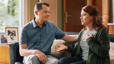 A husband listening empathetically as his wife shares her feelings with him.