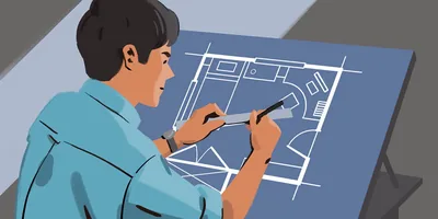 A young man prepares a blueprint