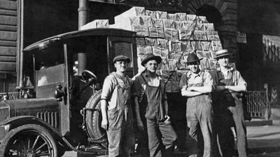 Brothers in Brooklyn, New York, with a truckload of The Golden Age