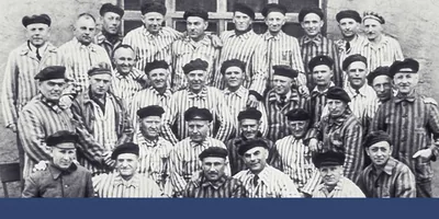 A group of brothers in Germany, still in their prison uniforms, after their liberation from a concentration camp in 1945