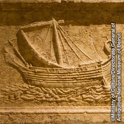 A relief carving of a large cargo ship