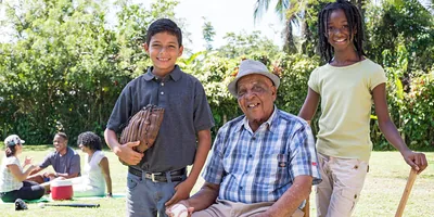 Samuel Hamilton with young people in the congregation