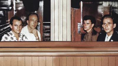 On a train traveling from Cape Town to Johannesburg with Dennis Leech, Ken Nordin, and Bill McLellan in 1959