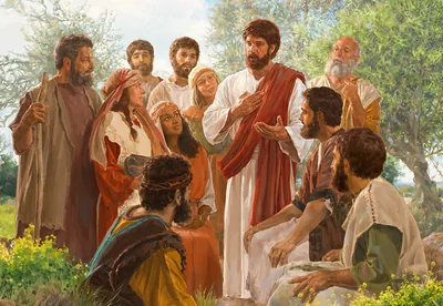 Jesus teaches people who have gathered around him