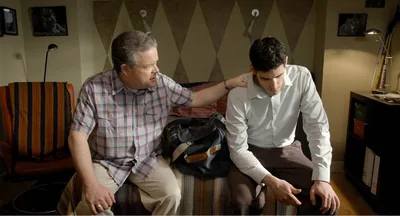 John Barker talks with his older son, James