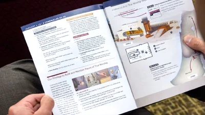 A brother holds a midweek meeting workbook