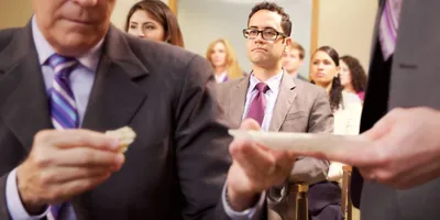 One of Jehovah’s Witnesses partakes of the bread at the Memorial