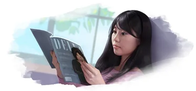 A young woman looks at a fashion magazine