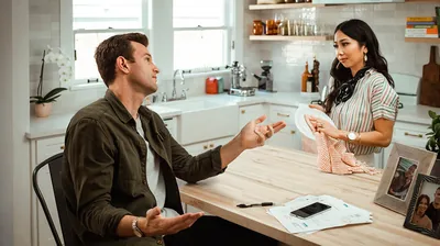 A newly married couple discussing their finances.