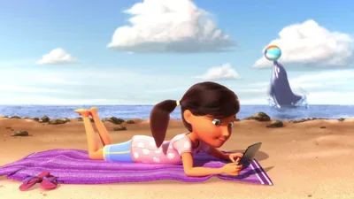 A scene from the video “The Best Use of Time.” While relaxing on the beach, Sophia uses her tablet and misses seeing a dolphin playing with a ball in the nearby water.