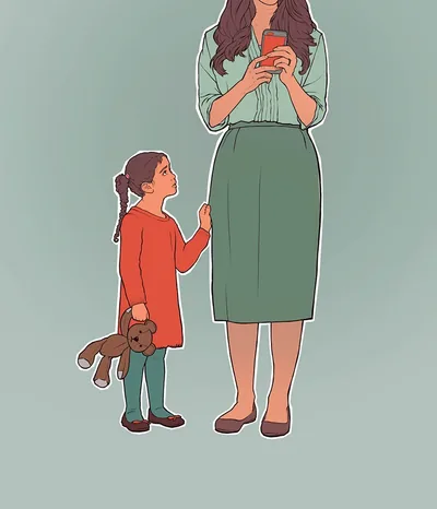 A mother is using her mobile device while her little girl is trying to get her attention