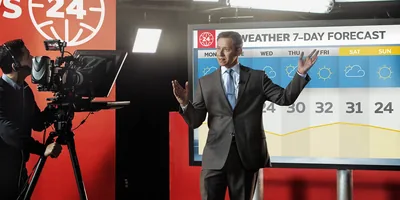 A weatherman gives the 7-day forecast