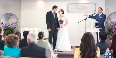 A bride and groom have just been pronounced husband and wife