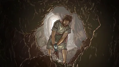 An Israelite man using a pickax inside a cave.