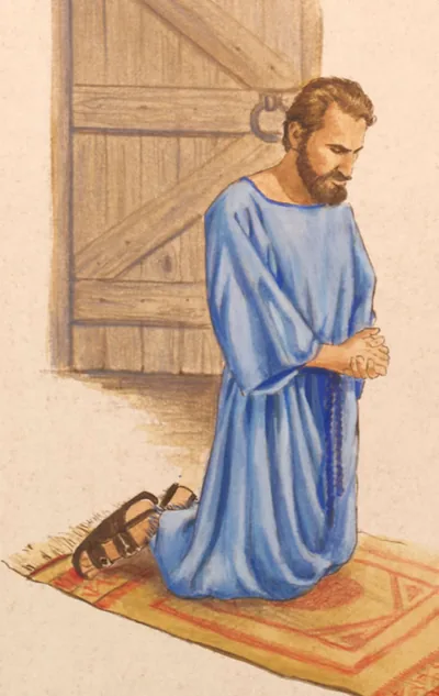 Behind a closed door, in a private room, a man kneels in prayer