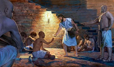 Joseph passing out food to other prisoners.