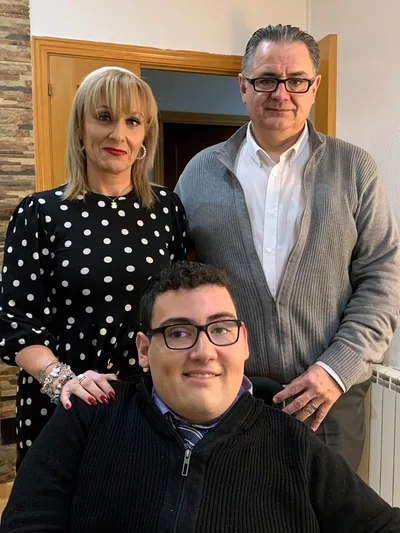 Isabel with her husband and son.