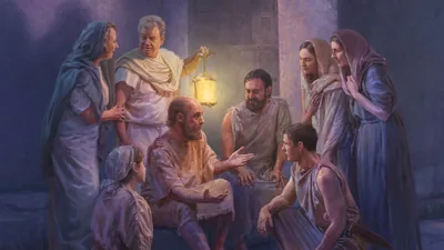 Paul and Silas witnessing to the jailer and his family at night. They all listen attentively.