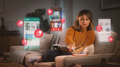 A sister trying to read the Bible at home while being distracted by alerts on her smartphone from a social media app, a movie app, and a shopping app.