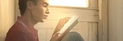 A young man reading the Bible.