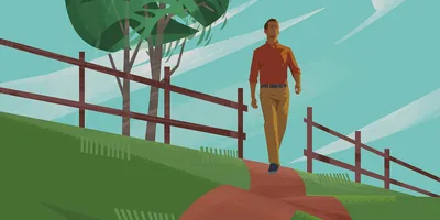 A man walks down a path