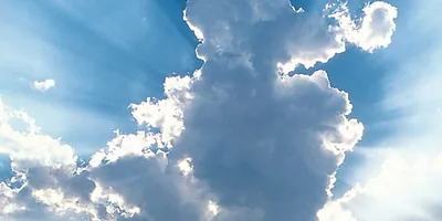 Sunlight shining through clouds.