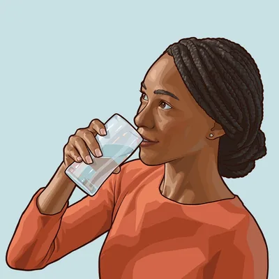 A woman drinking a glass of water.