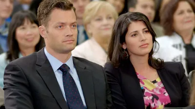 A couple at a meeting of Jehovah’s Witnesses